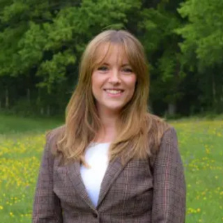 Portret van Rhi Leedam